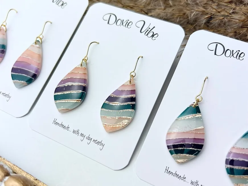 Agate-style teardrop clay earrings striped in mauve, sage and gold