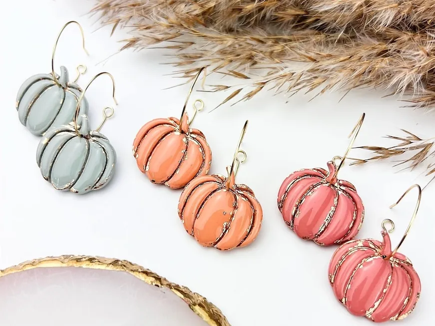 Clay pumpkin earrings in sage, coral and pink on gold hoops